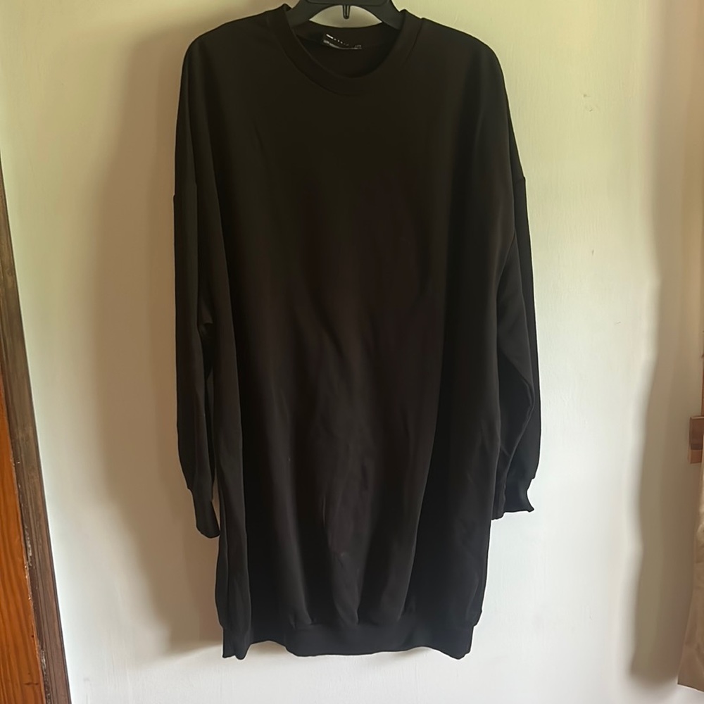 Asos long black sweater. Says size 6 but is very roomy.